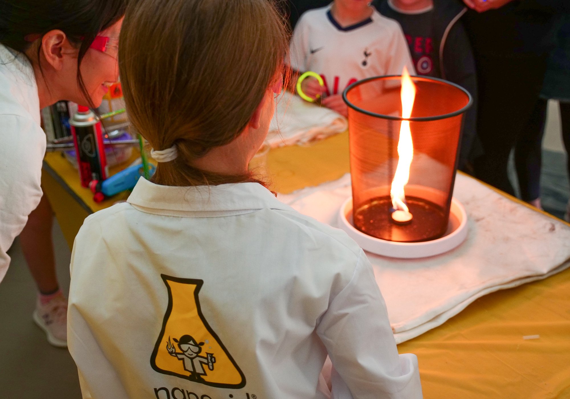 Girl watches firework at amazing nanogirl birthday party