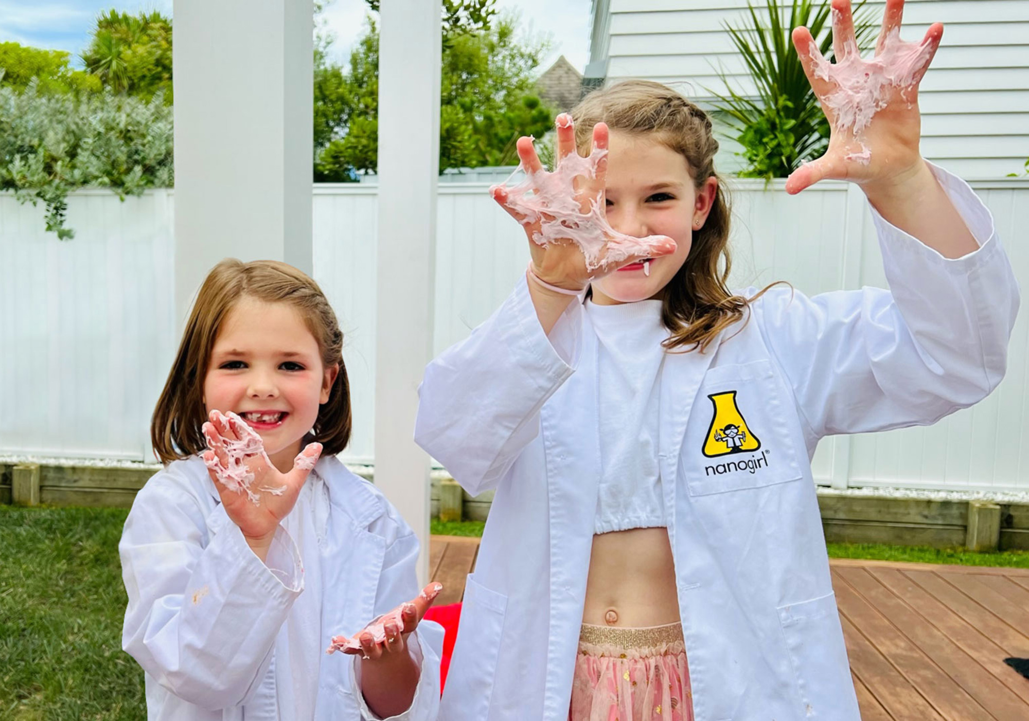 Girls play with slime at nanogirl birthday party