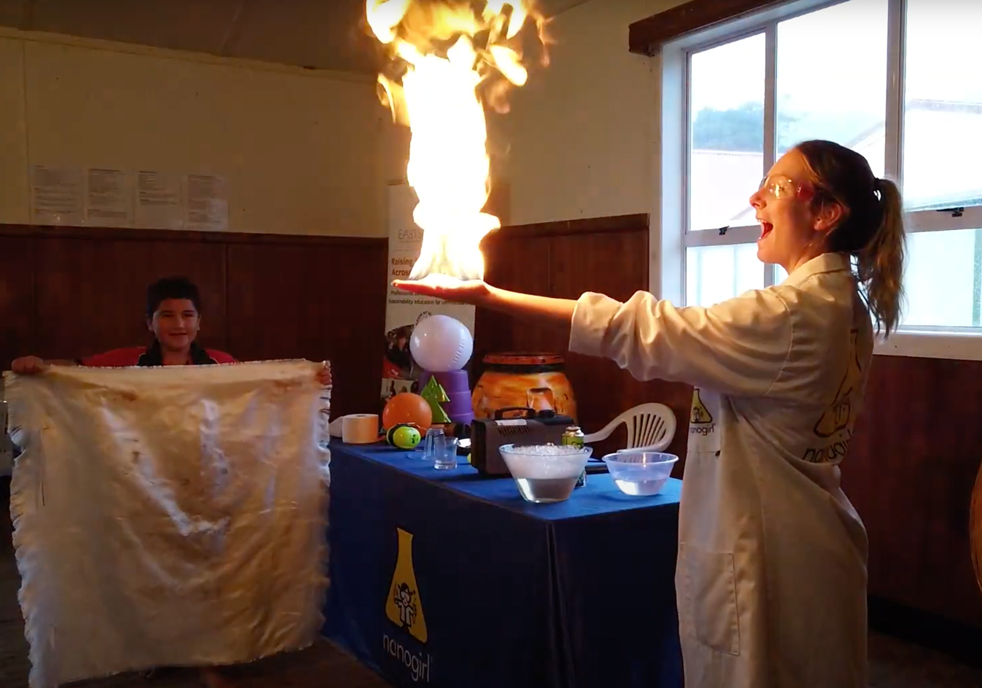 Hand on fire experiment at science in school show